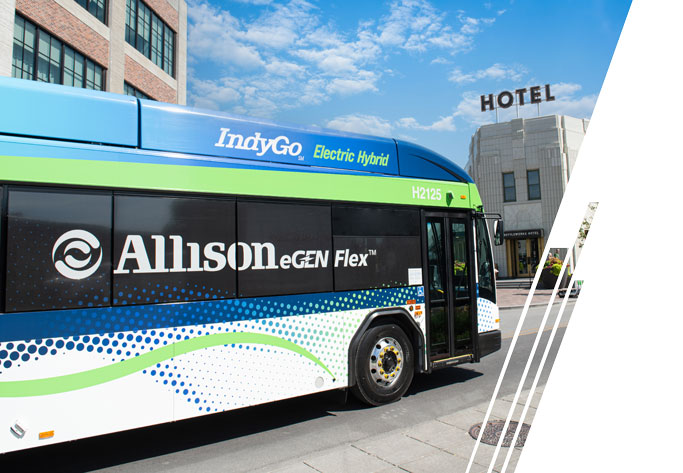 A blue and green transit IndyGo bus with 